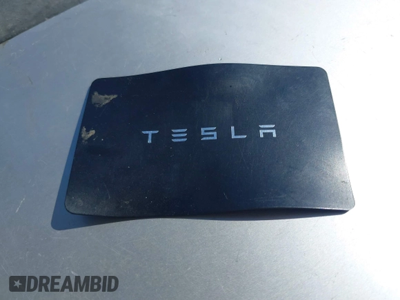 2018 Tesla Model 3 Long Range Battery with VIN 5YJ3E1EAXJF108781, listed as a IAAI auction lot 41962628 with 61,208 mi miles and . Bid and sale history available at DreamBid. Image 11.