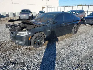 2014 BMW 5 Series 535i xDrive with VIN WBA5B3C51ED532766, listed as a IAAI auction lot 41368436 with Not Provided miles and . Bid and sale history available at carsss.com. Image 2.