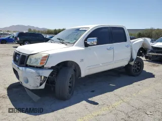 2004 Nissan Titan SE with VIN 1N6AA07A24N521744, listed as a Copart auction lot 58012925 with 268,270 mi miles and Salvage title. Bid and sale history available at DreamBid. Image 1.