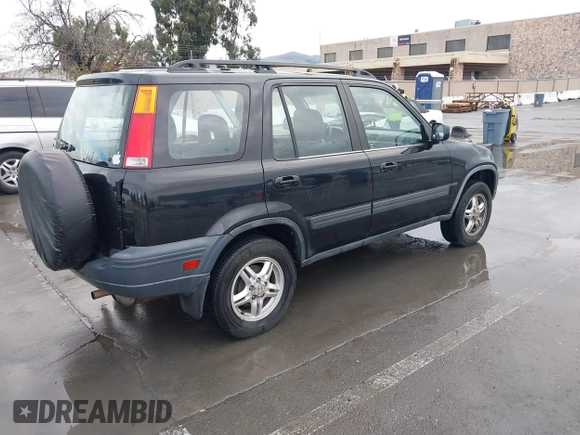 1999 Honda CR-V EX with VIN JHLRD1766XC007185, listed as a IAAI auction lot 41534901 with 271,063 mi miles. Bid and sale history available at carsss.com. Image 4.