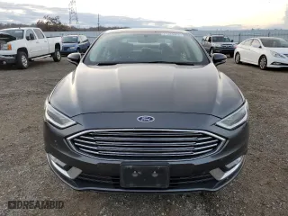 2017 Ford Fusion Energi SE with VIN 3FA6P0PU3HR354658, listed as a Copart auction lot 71824902 with 67,618 mi miles. Bid and sale history available at carsss.com. Image 5.