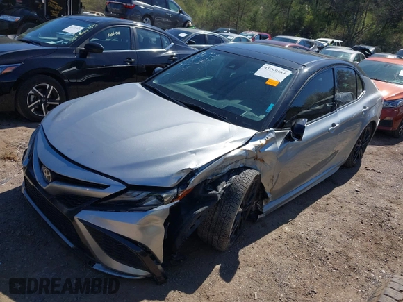 2022 Toyota Camry TRD with VIN 4T1KZ1AK8NU061810, listed as a IAAI auction lot 41769584 with 79,709 mi miles and . Bid and sale history available at DreamBid. Image 17.
