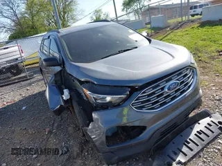 2021 Ford Edge SE z VIN 2FMPK3G95MBA01739, wystawiony jako IAAI lot #42000276 z przebiegiem 83 826 mil mil oraz . Historia ofert i sprzedaży dostępna na DreamBid. Obrazek 1.