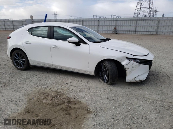 2019 Mazda Mazda3 Hatchback w/Preferred Pkg with VIN JM1BPAMM8K1135019, listed as a Copart auction lot 42312553 with 59,721 mi miles. Bid and sale history available at carsss.com. Image 4.
