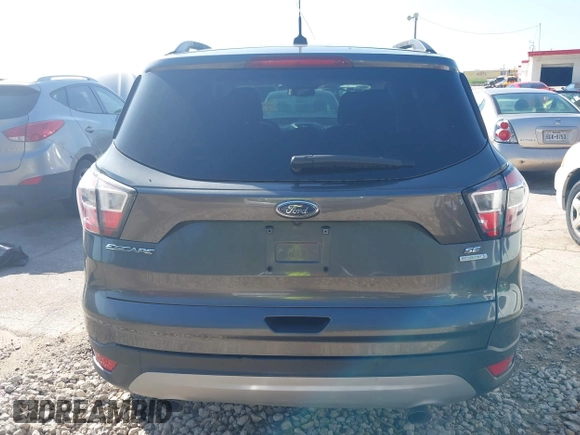 2017 Ford Escape SE with VIN 1FMCU0GD7HUA38402, listed as a IAAI auction lot 41964197 with 205,577 mi miles. Bid and sale history available at carsss.com. Image 16.