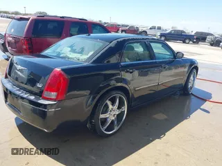 2006 Chrysler 300 Touring with VIN 2C3KA53G46H435401, listed as a IAAI auction lot 41662596 with 205,503 mi miles and . Bid and sale history available at DreamBid. Image 4.