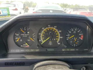 1989 Mercedes-Benz 300 E с VIN WDBEA30DXKA877386, выставлен на аукционе Copart как лот 59333665 с пробегом 205 173 миль миль и Чистый • Clean title. История ставок и продаж доступна на DreamBid. Изображение 9.