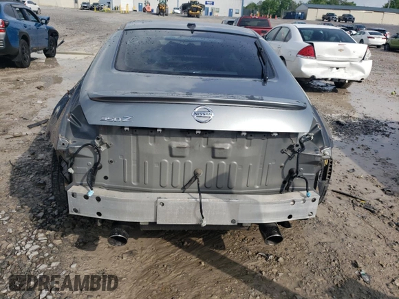 2004 Nissan 350Z Touring with VIN JN1AZ34D24M103656, listed as a Copart auction lot 55100955 with 130,561 mi miles and Salvage title. Bid and sale history available at DreamBid. Image 6.