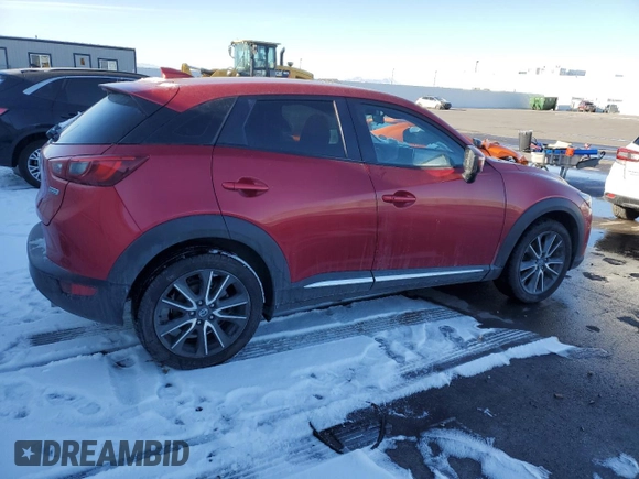 2016 Mazda CX-3 Grand Touring with VIN JM1DKBD78G0113185, listed as a Copart auction lot 42802145 with 158,068 mi miles and Salvage Title. Bid and sale history available at DreamBid. Image 3.