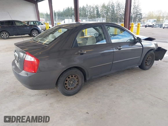2004 Kia Spectra LX with VIN KNAFE121145031237, listed as a IAAI auction lot 41954550 with 133,744 mi miles. Bid and sale history available at carsss.com. Image 4.