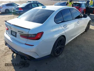 2020 BMW 3 Series M340i with VIN WBA5U7C02LFH69972, listed as a IAAI auction lot 41869845 with 45,926 mi miles. Bid and sale history available at carsss.com. Image 4.