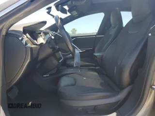 2016 Tesla Model S 90D z VIN 5YJSA1E20GF153799, wystawiony jako Copart lot #56104665 z przebiegiem 115 674 mil mil oraz Szkoda całkowita • Salvage title. Historia ofert i sprzedaży dostępna na DreamBid. Obrazek 7.