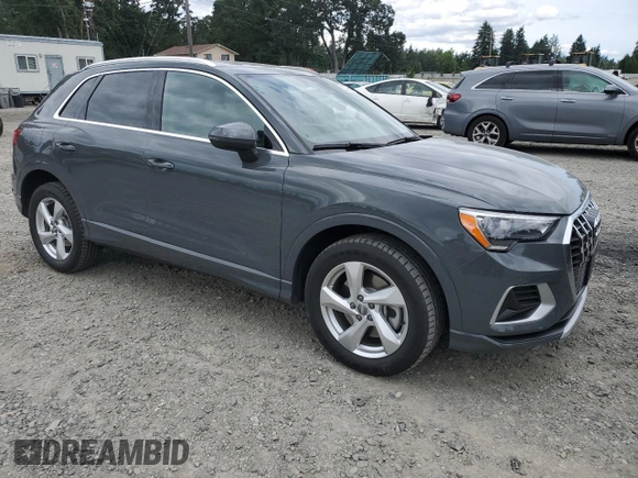 2020 Audi Q3 Premium with VIN WA1AECF31L1002342, listed as a Copart auction lot 60729665 with 29,154 mi miles and Salvage title. Bid and sale history available at DreamBid. Image 4.