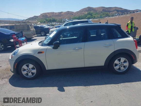 2016 MINI Hardtop 4 Door with VIN WMWXU1C56G2D10605, listed as a IAAI auction lot 42411431 with 35,367 mi miles and . Bid and sale history available at DreamBid. Image 13.