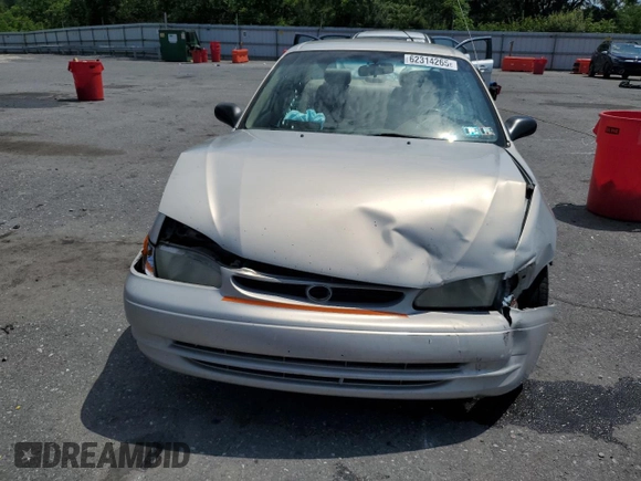 1999 Toyota Corolla VE z VIN 2T1BR12E3XC107587, wystawiony jako Copart lot #62314265 z przebiegiem 143 734 mil mil oraz Szkoda całkowita • Salvage title. Historia ofert i sprzedaży dostępna na DreamBid. Obrazek 5.