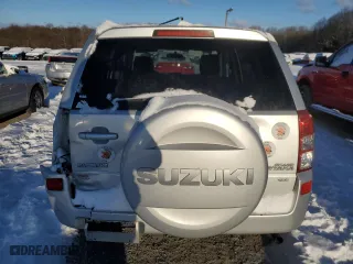 2010 Suzuki Grand Vitara Premium with VIN JS3TD0D24A4100420, listed as a Copart auction lot 87454774 with 113,624 mi miles and Salvage Title. Bid and sale history available at carsss.com. Image 6.