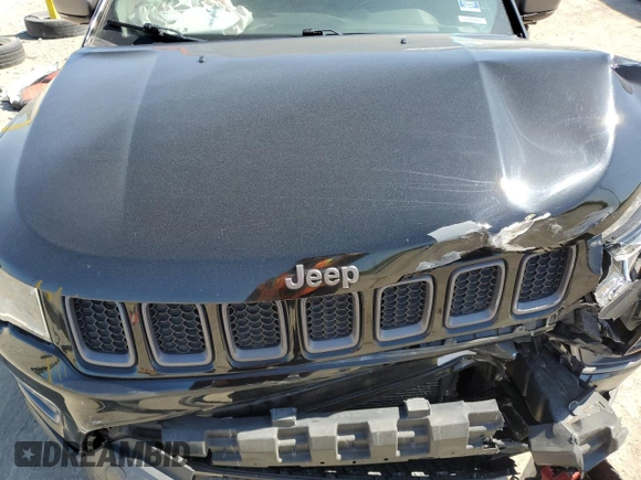 2018 Jeep Compass Trailhawk with VIN 3C4NJDDB6JT231480, listed as a Copart auction lot 56474865 with 61,051 mi miles and Salvage title. Bid and sale history available at DreamBid. Image 12.