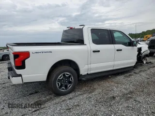 2023 Ford F-150 Lightning Pro z VIN 1FTVW1ELXPWG63466, wystawiony jako Copart lot #59163895 z przebiegiem Nie podano mil oraz Szkody całkowita. Historia ofert i sprzedaży dostępna na DreamBid. Obrazek 3.