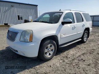 2007 GMC Yukon Denali z VIN 1GKFK63817J134498, wystawiony jako Copart lot #61135185 z przebiegiem 241 912 mil mil oraz Czysty tytuł • Clean title. Historia ofert i sprzedaży dostępna na DreamBid. Obrazek 1.