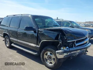 1999 Chevrolet Tahoe Z71 with VIN 1GNEK13R3XJ460393, listed as a IAAI auction lot 41773500 with 148,691 mi miles and . Bid and sale history available at DreamBid. Image 1.