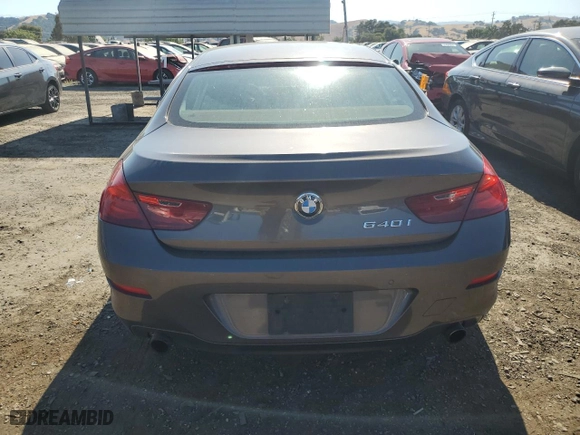 2013 BMW 6 Series 640i with VIN WBA6A0C53DDZ03673, listed as a Copart auction lot 68148144 with 102,703 mi miles and Salvage Title. Bid and sale history available at carsss.com. Image 6.