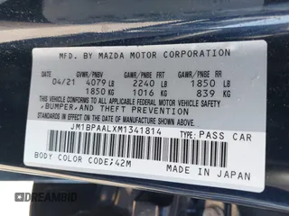 2021 Mazda 3 S with VIN JM1BPAALXM1341814, listed as a IAAI auction lot 42797513 with 32,167 mi miles and . Bid and sale history available at DreamBid. Image 9.