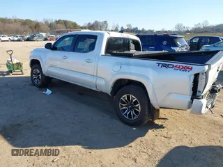 2021 Toyota Tacoma 4WD SR5 with VIN 3TYDZ5BN3MT001860, listed as a IAAI auction lot 41269423 with 23,378 mi miles. Bid and sale history available at carsss.com. Image 3.