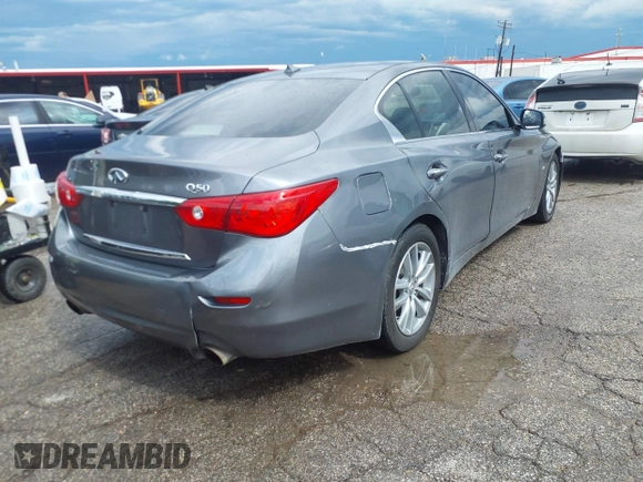 2014 Infiniti Q50 Premium with VIN JN1BV7AP6EM685056, listed as a IAAI auction lot 42188435 with 203,880 mi miles and . Bid and sale history available at carsss.com. Image 4.