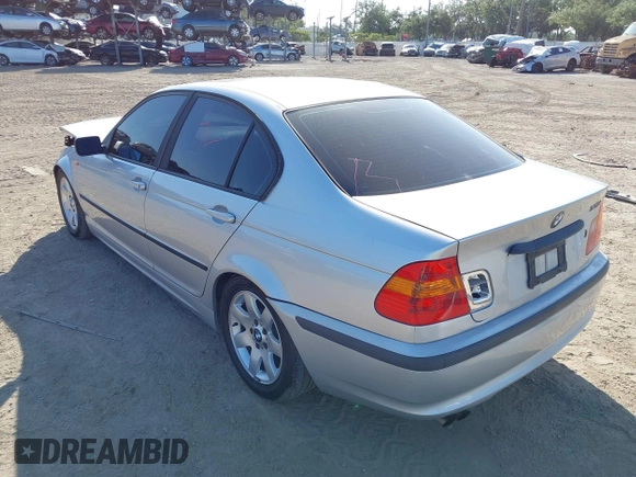 2002 BMW 3 Series 325i with VIN WBAEV33412KL55500, listed as a IAAI auction lot 42008308 with 172,852 mi miles. Bid and sale history available at carsss.com. Image 3.