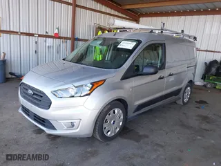 2021 Ford Transit Connect Van XLT with VIN NM0LS7F23M1492352, listed as a IAAI auction lot 41594913 with 90,100 mi miles. Bid and sale history available at carsss.com. Image 17.