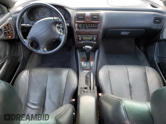 1999 Subaru Legacy Outback with VIN 4S3BG6850X7649578, listed as a Copart auction lot 56654155 with 174,651 mi miles and Salvage title. Bid and sale history available at DreamBid. Image 8.