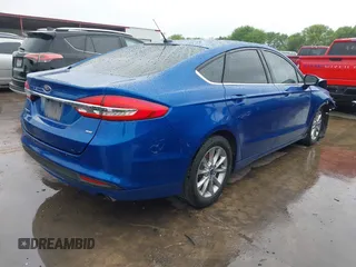 2017 Ford Fusion SE z VIN 3FA6P0H79HR170835, wystawiony jako IAAI lot #41911416 z przebiegiem 67 219 mil mil oraz . Historia ofert i sprzedaży dostępna na DreamBid. Obrazek 4.
