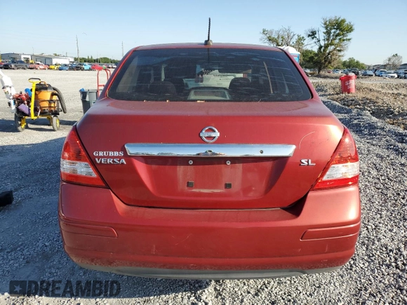 2010 Nissan Versa S with VIN 3N1BC1AP6AL443004, listed as a Copart auction lot 52010495 with 118,801 mi miles and Non Repairable. Bid and sale history available at DreamBid. Image 6.