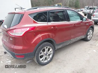 2014 Ford Escape SE z VIN 1FMCU9G91EUB07502, wystawiony jako IAAI lot #41166006 z przebiegiem 209 625 mil mil oraz . Historia ofert i sprzedaży dostępna na DreamBid. Obrazek 4.