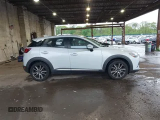 2016 Mazda CX-3 Grand Touring z VIN JM1DKBD71G0126151, wystawiony jako IAAI lot #42215837 z przebiegiem 81 349 mil mil oraz . Historia ofert i sprzedaży dostępna na DreamBid. Obrazek 13.