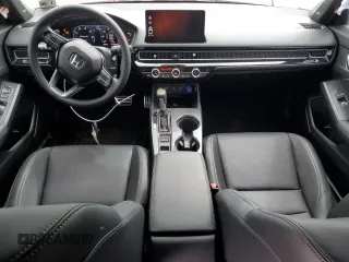 2025 Honda Civic Sport z VIN 2HGFE4F82SH306715, wystawiony jako Copart lot #53560565 z przebiegiem 6287 mil mil oraz Szkody całkowita. Historia ofert i sprzedaży dostępna na DreamBid. Obrazek 8.