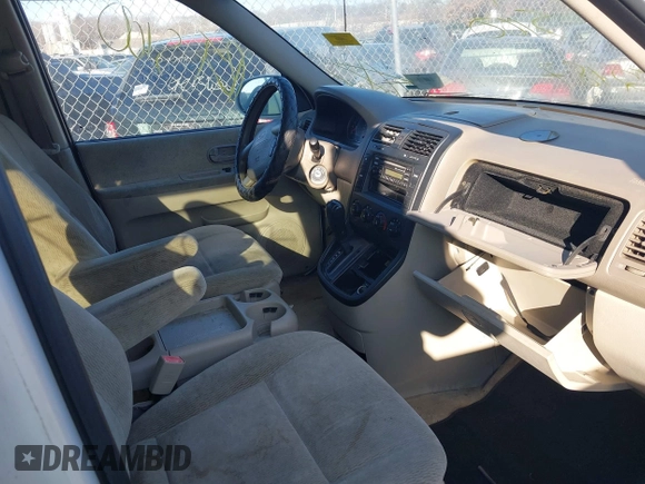 2005 Kia Sedona LX with VIN KNDUP132756764528, listed as a IAAI auction lot 41709414 with 999,999 mi miles. Bid and sale history available at carsss.com. Image 5.
