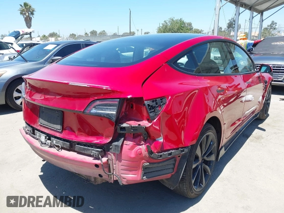 2023 Tesla Model 3 z VIN 5YJ3E1EA4PF454981, wystawiony jako IAAI lot #42704135 z przebiegiem 93 008 mil mil oraz . Historia ofert i sprzedaży dostępna na DreamBid. Obrazek 4.