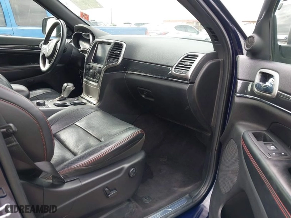 2018 Jeep Grand Cherokee Trailhawk with VIN 1C4RJFLTXJC365640, listed as a IAAI auction lot 41916380 with NaN miles. Bid and sale history available at carsss.com. Image 5.