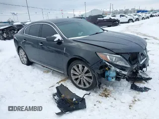 2013 Lincoln MKS EcoBoost with VIN 1LNHL9FT7DG604069, listed as a IAAI auction lot 41362256 with 92,789 mi miles. Bid and sale history available at carsss.com. Image 1.