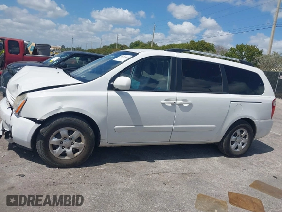 2010 Kia Sedona LX with VIN KNDMG4C33A6338047, listed as a IAAI auction lot 42128485 with 99,498 mi miles and . Bid and sale history available at carsss.com. Image 15.