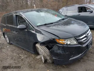 2016 Honda Odyssey SE with VIN 5FNRL5H39GB155488, listed as a IAAI auction lot 41702336 with 122,164 mi miles. Bid and sale history available at carsss.com. Image 1.