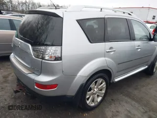 2009 Mitsubishi Outlander SE z VIN JA4MT31W89Z003101, wystawiony jako IAAI lot #41487678 z przebiegiem 90 226 mil mil oraz . Historia ofert i sprzedaży dostępna na DreamBid. Obrazek 4.