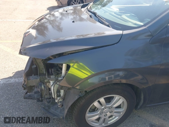 2014 Chevrolet Sonic LT with VIN 1G1JC6SG4E4118781, listed as a IAAI auction lot 41862192 with 124,375 mi miles. Bid and sale history available at carsss.com. Image 18.