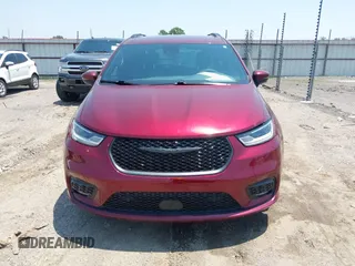 2023 Chrysler Pacifica Touring L with VIN 2C4RC1BG7PR513017, listed as a IAAI auction lot 42441272 with 23,310 mi miles and . Bid and sale history available at DreamBid. Image 12.