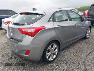2013 Hyundai Elantra GT with VIN KMHD35LEXDU114448, listed as a IAAI auction lot 41944985 with 71,180 mi miles. Bid and sale history available at carsss.com. Image 4.
