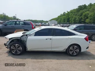 2016 Honda Civic EX-L z VIN 2HGFC1F79GH637326, wystawiony jako IAAI lot #42438274 z przebiegiem 215 846 mil mil oraz . Historia ofert i sprzedaży dostępna na DreamBid. Obrazek 15.