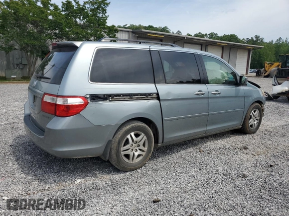 2005 Honda Odyssey EX-L with VIN 5FNRL38765B088756, listed as a Copart auction lot 57071365 with 243,277 mi miles and Salvage title. Bid and sale history available at DreamBid. Image 3.
