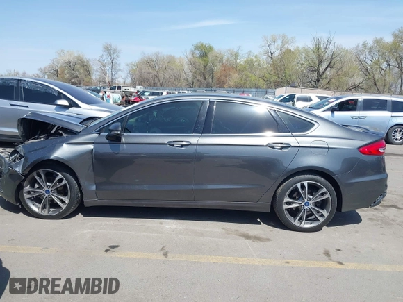2019 Ford Fusion Titanium with VIN 3FA6P0D90KR109985, listed as a IAAI auction lot 41993329 with Not provided miles and . Bid and sale history available at DreamBid. Image 14.