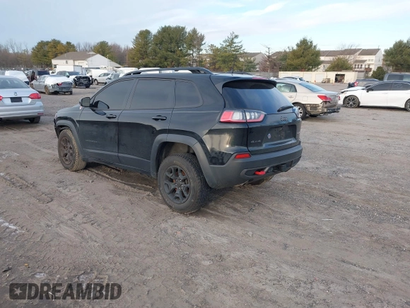 2022 Jeep Cherokee Trailhawk with VIN 1C4PJMBX0ND548397, listed as a IAAI auction lot 41240303 with 54,055 mi miles. Bid and sale history available at carsss.com. Image 3.
